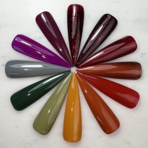 Painted nail tips featuring Nails Done Right fall gel polish colors