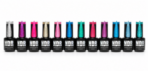 Twelve Nails Done Right gel polish bottles with matching color swatches from the Summer of 2023 Collection, arranged left to right