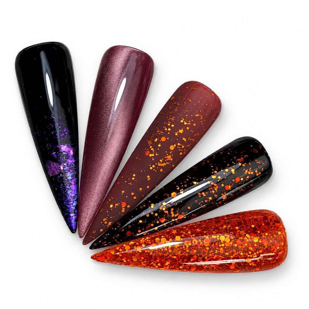 Five October NDR Pro Membership nail swatches: black with lavender chrome flakes, mauve cat eye, matte mauve with orange glitter, black with orange glitter, and bright orange glitter.